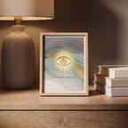 Ethereal Third Eye Chakra wall art print in a minimalist wooden frame, displayed on a wooden desk in a meditation sanctuary