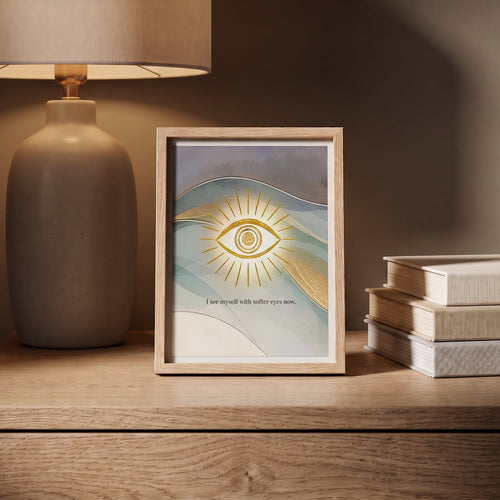 Ethereal Third Eye Chakra wall art print in a minimalist wooden frame, displayed on a wooden desk in a meditation sanctuary
